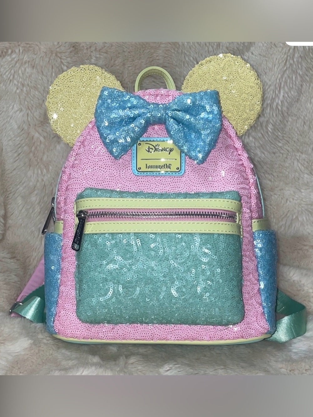 Limited Edition 2,800 - Loungefly Minnie
Mouse Pastel Sequin Mini Backpack
